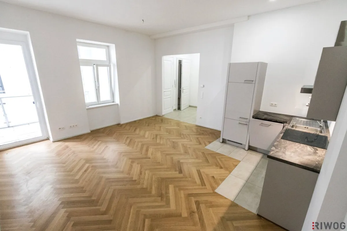 ALTBAU-BALKONWOHNUNG in HOF-RUHELAGE | MODERN SANIERT | Ca. 2 Min. zur U4 SCHÖNBRUNN | Ca. 15 Min. in den 1. Bezirk - Bild 1