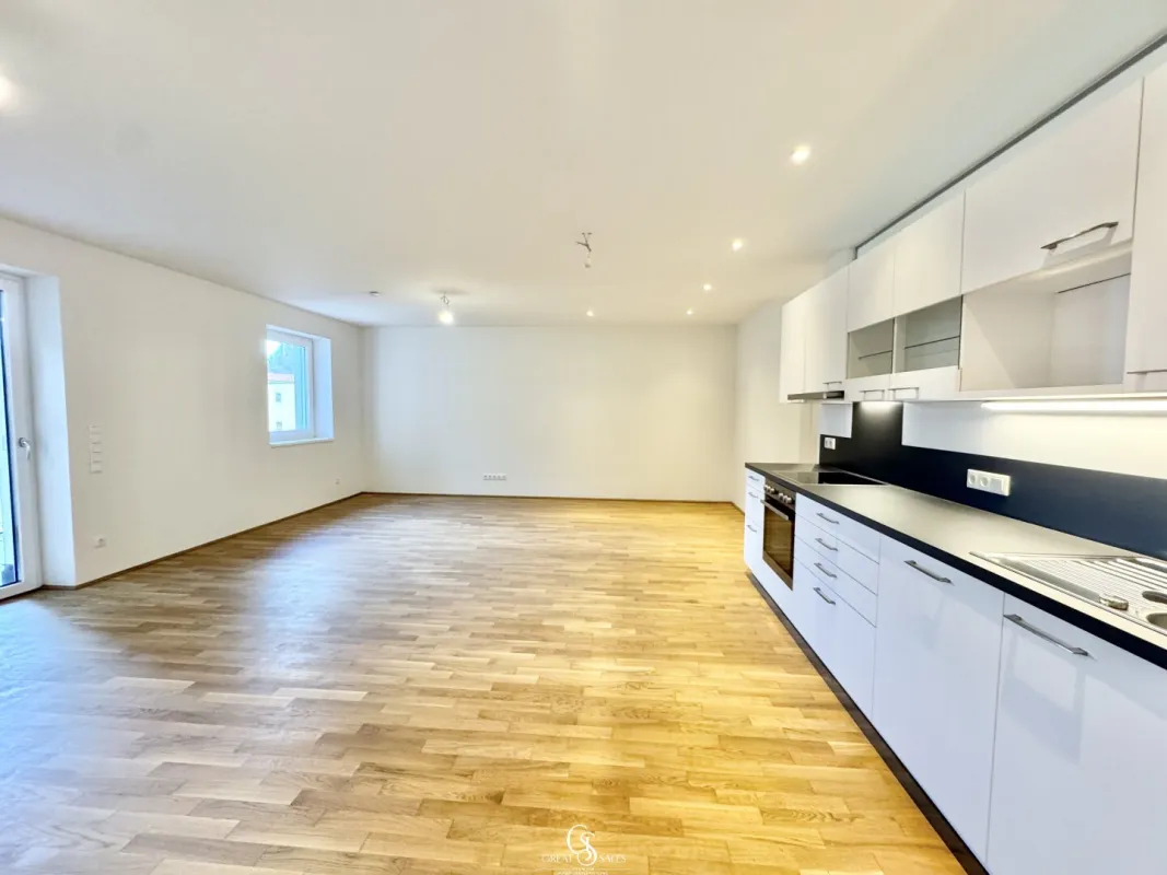 Exklusive Erstbezugswohnung mit Balkon und Blick auf den Schlossberg - Bild 1