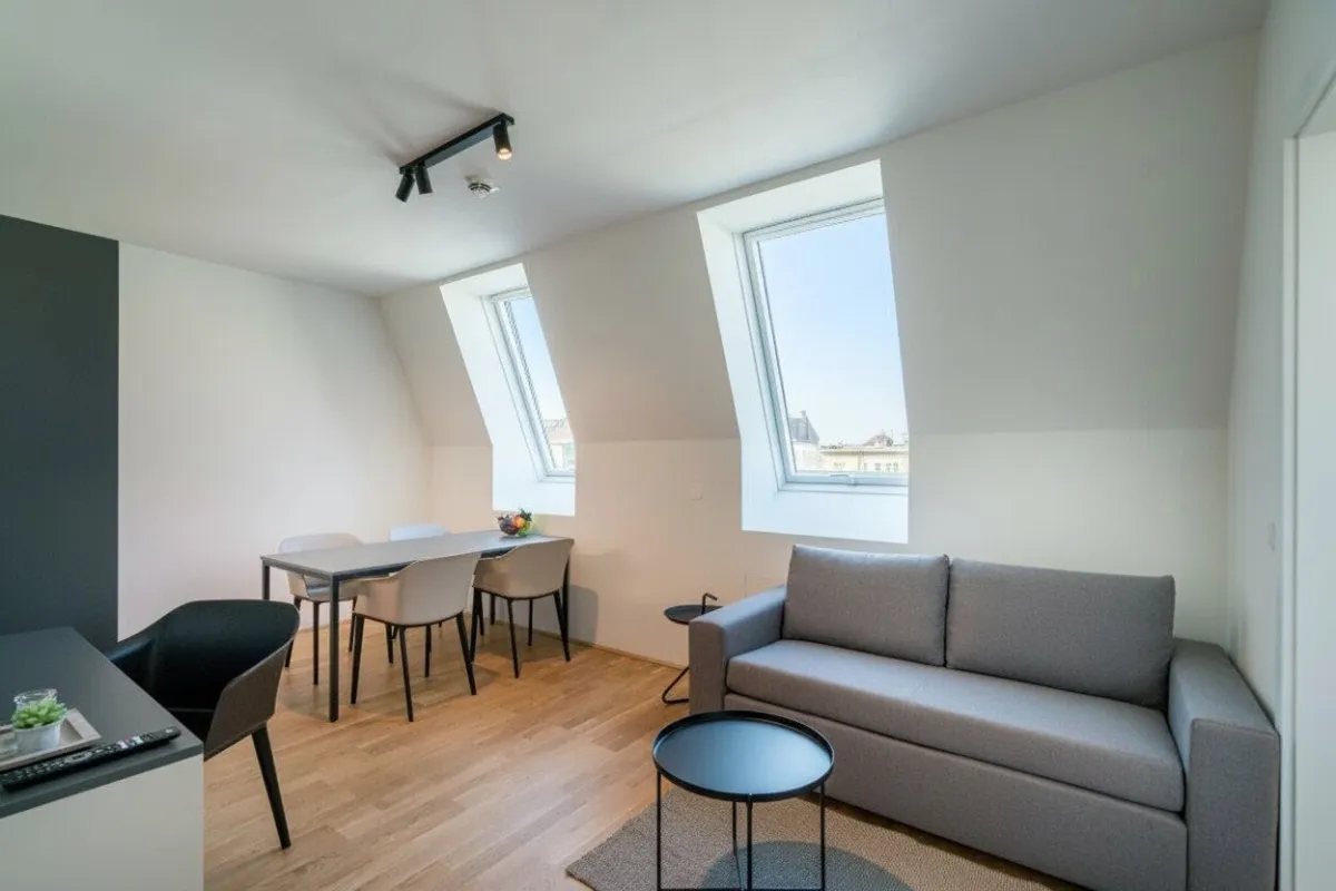 Kompakte 2-Zimmer DG-Wohnung - Bild 1