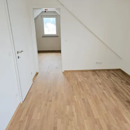 Erstbezug: Sonnige 2 Zimmer Wohnung mit Wohnküche - Bild 2