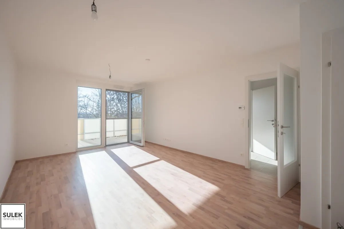 Perfekt geschnittene 2 Zimmer Wohnung mit sonnigem Balkon - ERSTBEZUG nahe Bahnhof Eisenstadt! - Bild 1