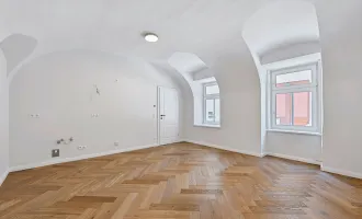 IDEAL FÜR VERMIETUNG! Apartment mit stilvoller Gewölbedecke und direktem Straßenzugang