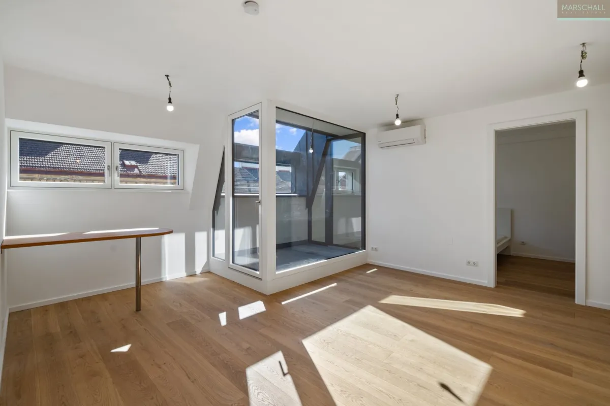 Charmante Dachgeschoßwohnung mit Terrasse - Bild 1
