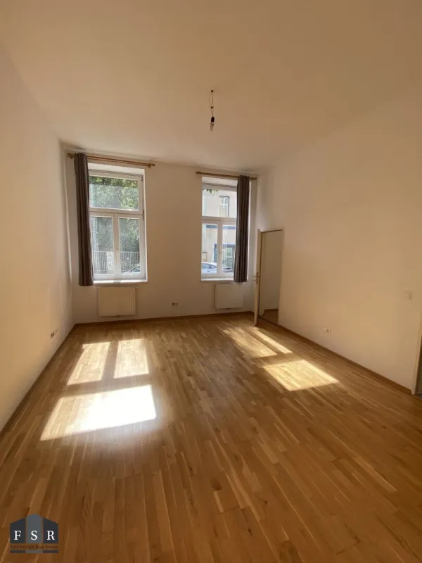 SCHNÄPPCHEN: Helle Singlewohnung mit Grünblick + Allgemeingarten zur Mitbenützung - Bild 1