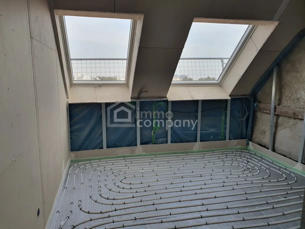 Stilvolle Dachgeschosswohnung mit Fußbodenheizung und Deckenkühlung – Komfort das ganze Jahr über!! - Bild 1