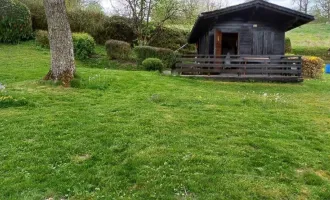 Baugrund ohne Bauzwang mit Gartenhaus zu kaufen