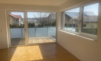 Die perfekte Familienwohnung mit 2 großzügigen Balkonen & Carport!
