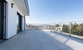 Exklusive Dachgeschosswohnung im 21. Bezirk – Modernes Wohnen mit Terrassen und bester Anbindung an die U1