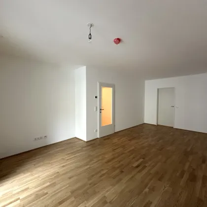 JETZT INVESTIEREN! Große 2-Zimmer Erstbezugswohnung mit getrennter Küche in atemberaubendem Neubauprojekt in guter Lage! PROVISIONSFREI - Bild 2