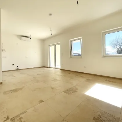 Moderne Gartenwohnung mit überdachter Terrasse - Bild 2