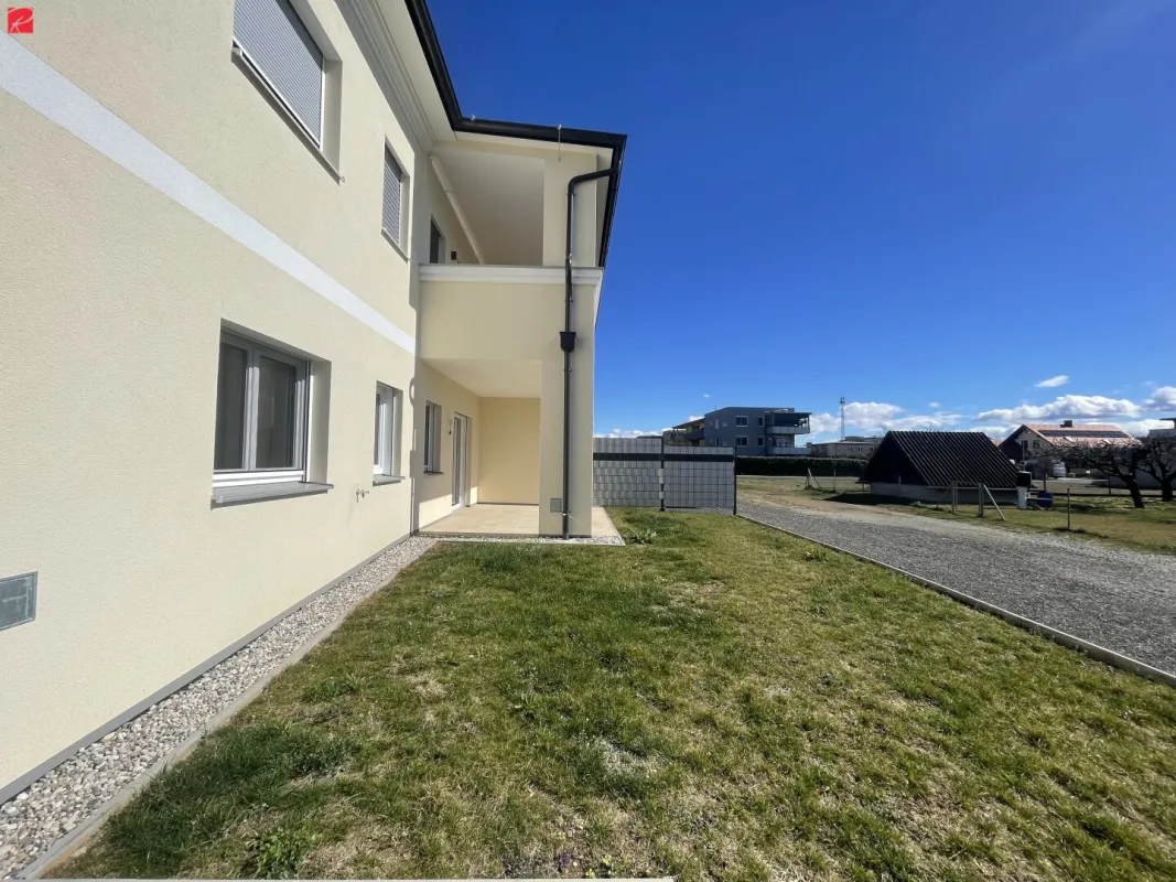 Moderne Gartenwohnung mit überdachter Terrasse - Bild 1