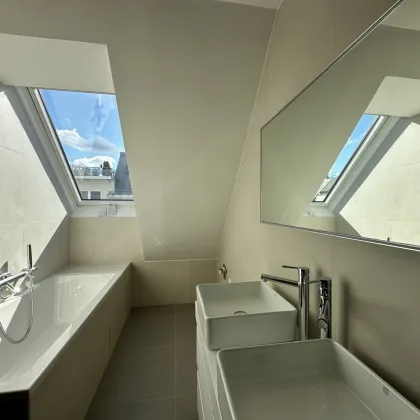 Modernes Neubau-Penthouse am Kutschkermarkt – Erdwärme, Fußbodenheizung & großzügige Dachterrasse! Garagenstellplatz - Bild 2