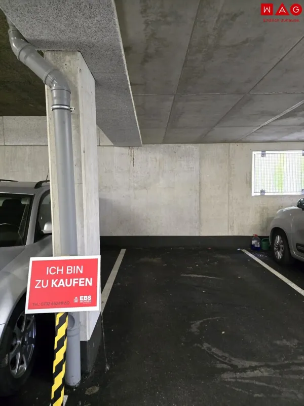 Schon vorgesorgt? Der Winter steht vor der Tür! Tiefgaragenplatz in modernem Neubau in St. Georgen/Gusen! Fußläufig zum Bahnhof und zum Ortskern! - Bild 1