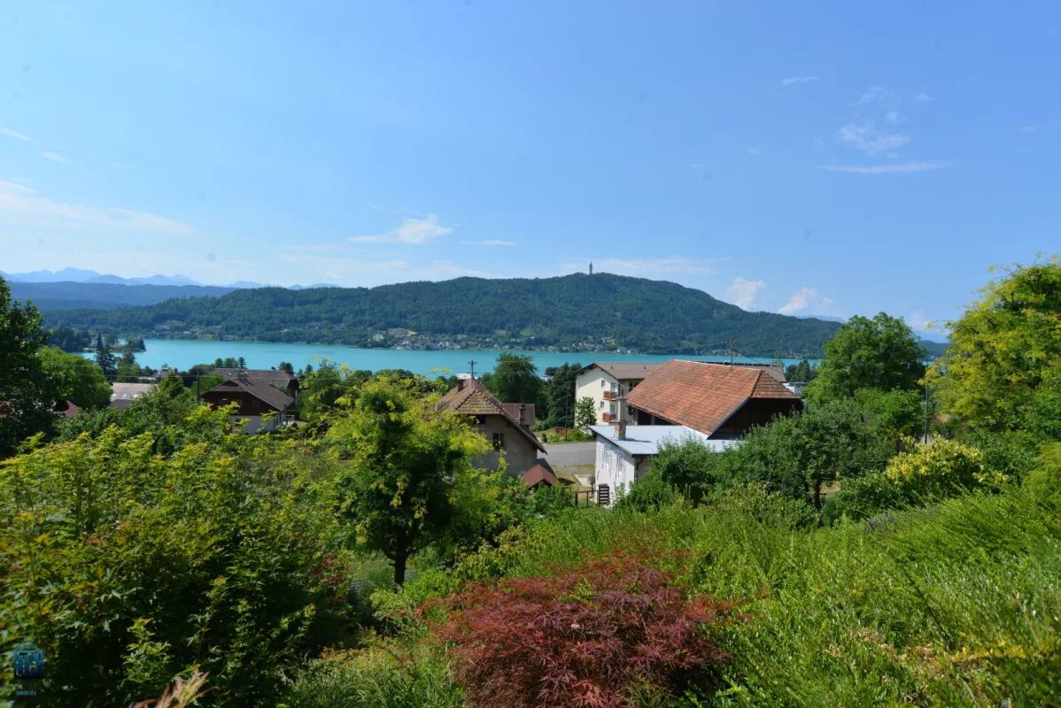 Beeindruckende Seeblick-Wohnung am Wörthersee zu verkaufen: 128 m" WNF  plus 35 m" Südterrasse, TG, Kellerabteil - ÜBERNAHME  mit MIETER sofort möglich - EIGENNUTZUNG ab 2026 möglich! - Bild 1