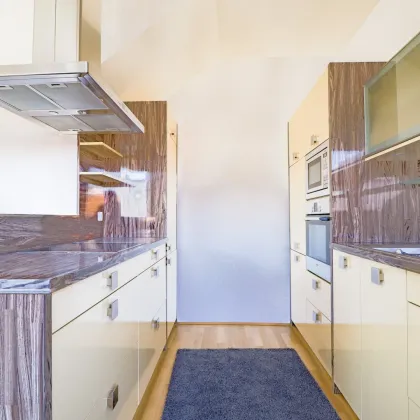 Urbaner Wohntraum mit Weitblick – Stilvolle 3-Zimmer-DG-Wohnung mit großer Dachterrasse - Bild 3