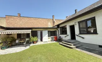 Famillienidylle: großes Einfamilienhaus mit Veranda und Wirtschaftsanbau mit wunderschönem uneinsichtigen Garten + DG-Ausbaupotential!