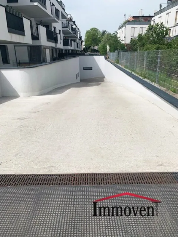 PKW- und Motorrad-Garagenstellplatz in der Michael-Res-Gasse, 1210 Wien - Bild 1