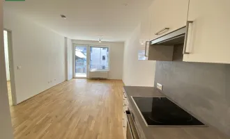Tolle Neubau-Wohnung mit großem Innenhof-Balkon nahe S-Bahn Jedlersdorf, Straßenbahn 26 und SCN mit Einbauküche und Abstellraum!