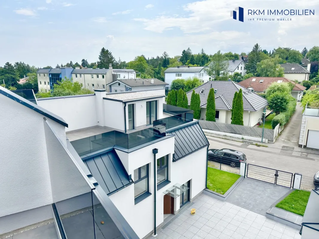 Neubau-Reihenhaus mit Garten und Dachterrasse, nahe dem Wienerwald - Bild 1