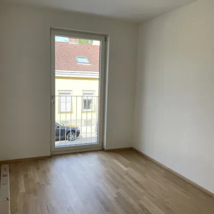 Helle Neubauwohnung mit kleiner Terrasse beim Kagranerplatz mit Grünblick! - Bild 3