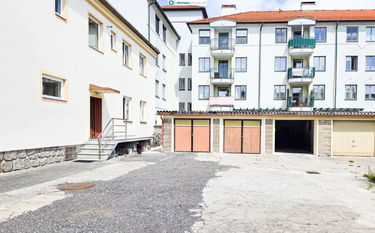 Helle Eigentumswohnung mit guter Raumaufteilung, Garage und eigenem kleinen Garten - Bild 1