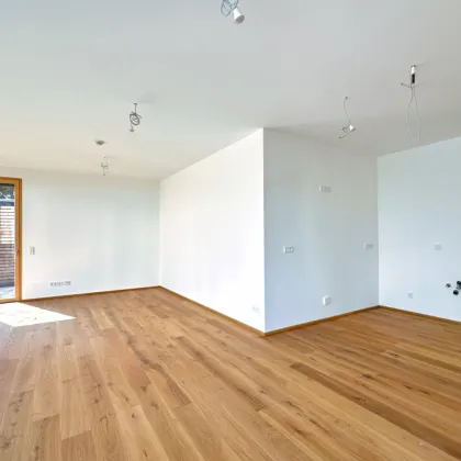 Großzügige Familienwohnung mit großem Eigengarten - Bild 2