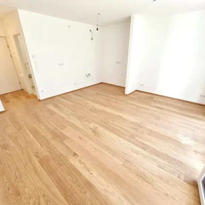 Grünblick für die Seele - Cashflow fürs Konto! Perfektes Investment! Kompakter Grundriss mit großem Balkon! Blick ins Grüne + Komplette Ruhelage + Energieeffizienz + Perfekte Anbindung und Nahversorgung! Jetzt zugfreifen! - Bild 2
