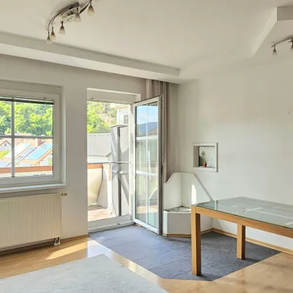 Idyllische Familienwohnung mit Grünblick und großem Gemeinschaftsgarten - Bild 3