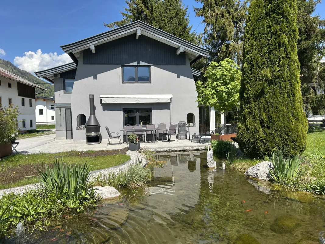 Charmantes Einfamilienhaus mit idyllischem Garten & befristetem Wohnrecht – Kössen - Bild 1