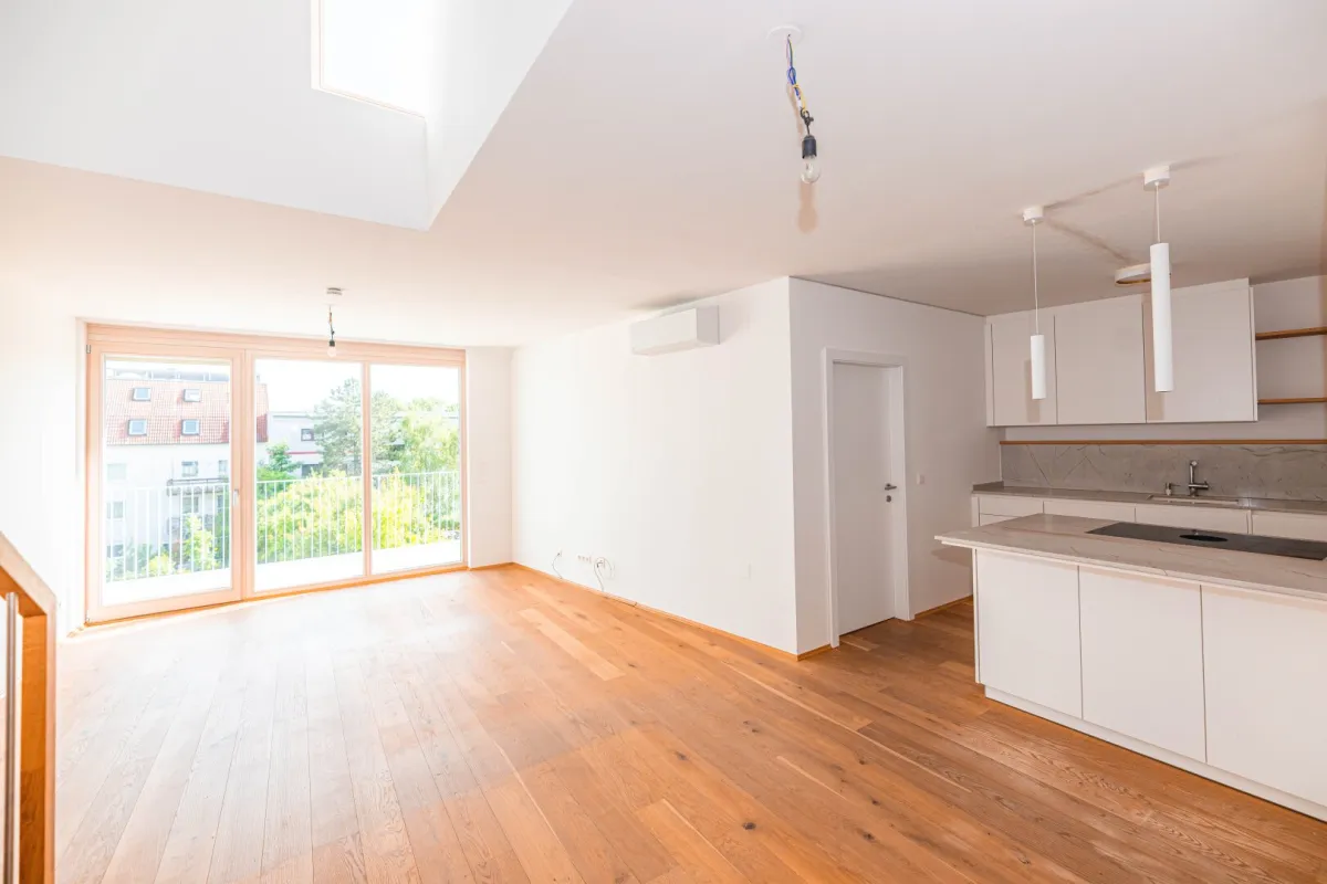 Traumwohnung mit 50 m² Dachterrasse, E-Ladestation und Topausstattung - Bild 1
