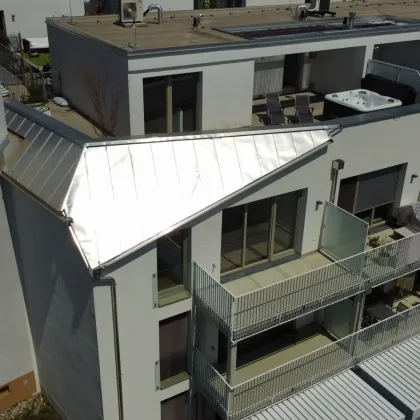 Traumwohnung mit 50 m² Dachterrasse, E-Ladestation und Topausstattung - Bild 3