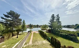 NEUWERTIGES Haus am Pöttschinger See - BJ 2022 - ca. 574m² Pachtgrund - ca. 198m² NFL - 4 Zimmer - 2 Bäder - Balkon und Terrasse - neuwertige Einbauküche - große Doppelgarage - Direkter Seezugang