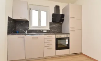 IM HERZEN VON GRAZ: Stylishe 2-Zimmer-Wohnung mit Panoramablick auf den Schlossberg – Toplage in Geidorf!