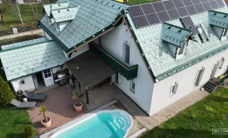 Exklusives Einfamilienhaus mit Pool, großem Garten und Doppelgarage | ZELLMANN IMMOBILIEN