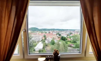 Zentraler Wohntraum mit schöner Aussicht!