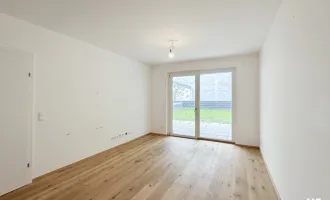 Gartenwohnung mit 120 m² Grünfläche mit exklusiver Ausstattung & Garagenoption