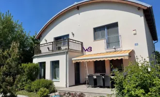 Großzügiges Einfamilienhaus mit Garage und Swimmingpool in einer begehrten Lage von Hagenbrunn!
