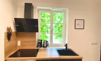 Wunderschöne Garonniere in kernsaniertem Stadthaus in top Lage