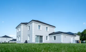 ** Eleganz und Komfort: Stilvolle und energieeffiziente Residenz mit Seezugang und Doppelgarage **