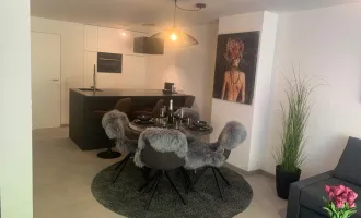 Erstbezug: Wohnung mit Reihenhauscharakter mit Wintergarten in Grünlage