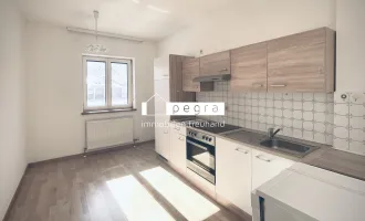 Top 2: Gemütliche 2-Zimmer-Wohnung mit separater Küche und PKW-Stellplatz