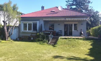 RARITÄT! Top gepflegter, voll unterkellerter Bungalow mit Ausbaupotential auf EIGENGRUND - nur 1 Minute zur Wiener Stadtgrenze!