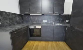 Moderne Investitionschance: Stilvolle Wohnung mit Balkon und Carport – sichere Mieteinnahmen bis mindestens 30.04.2027