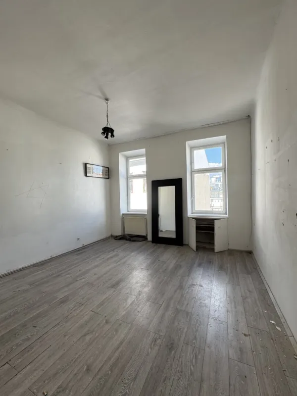 Altbauwohnung mit Entwicklungspotenzial in urbaner Ruhelage - Bild 1