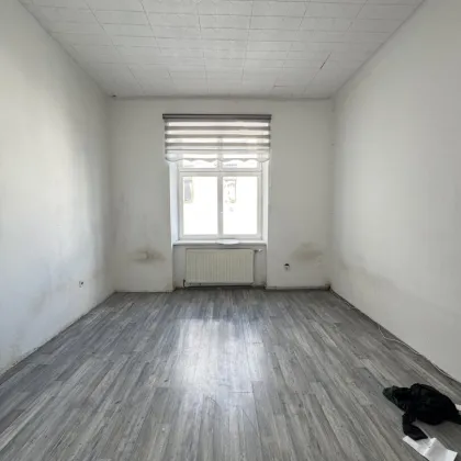 Altbauwohnung mit Entwicklungspotenzial in urbaner Ruhelage - Bild 3