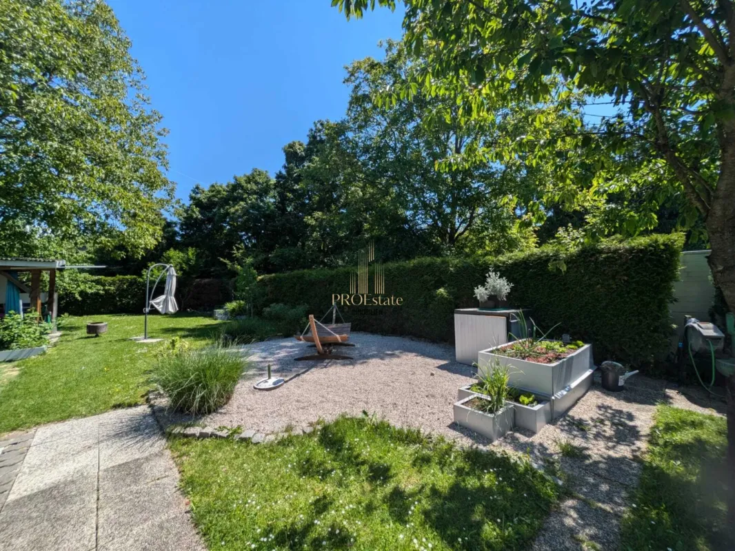 Mehrfamilienhaus mit Potenzial in Ansfelden: 240 m² WNF, Doppeltgarage und großer Garten! - Bild 1