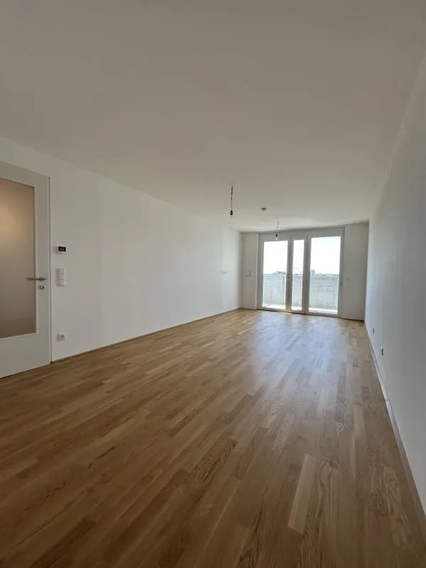 Traumhafte 3-Zimmer Wohnung in Wien: Erstbezug mit Balkon und Garage! - Bild 1