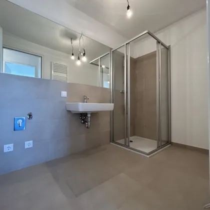 Traumhafte 3-Zimmer Wohnung in Wien: Erstbezug mit Balkon und Garage! - Bild 3