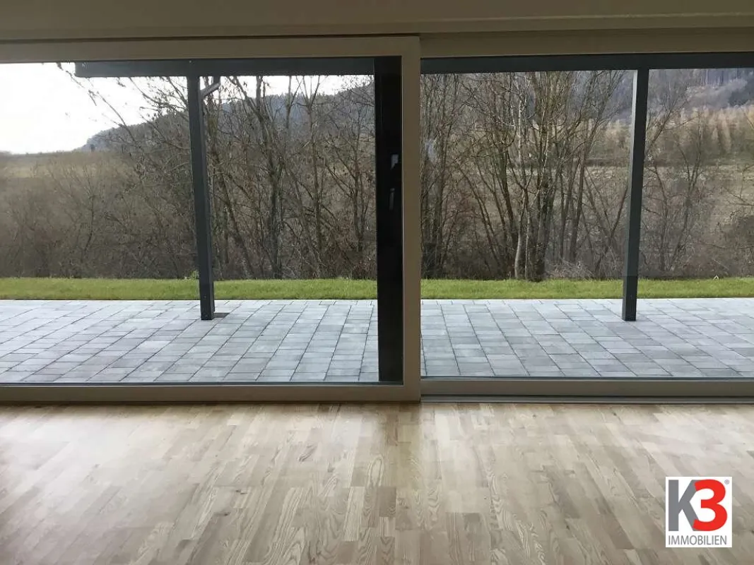 K3 - LEISTBARER LUXUS. Traumhaftes Einfamilienhaus im Erstbezug. Hochwertige und elegante Ausführung.. Carport. Doppelhausanlage. Unverbaubarer Fernblick nach Süden. - Bild 1