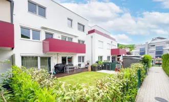 Neuwertige Gartenwohnung mit Terrasse und 2 Garagenplätze